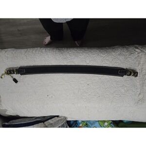 Coach Belt With Brass Embellishments.